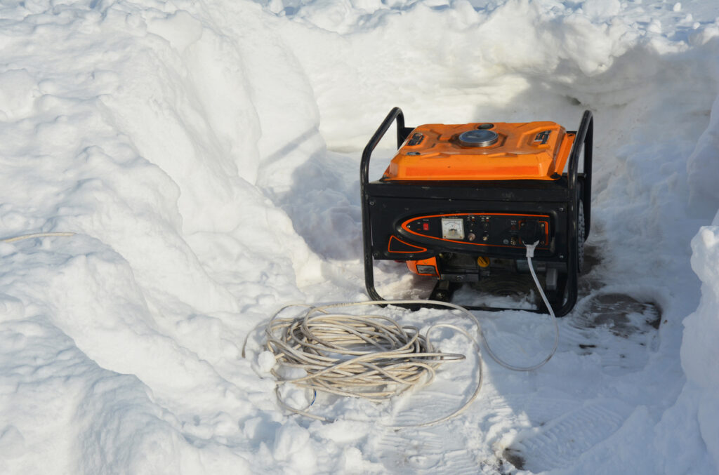 backup power generator around snow after severe winter weather
